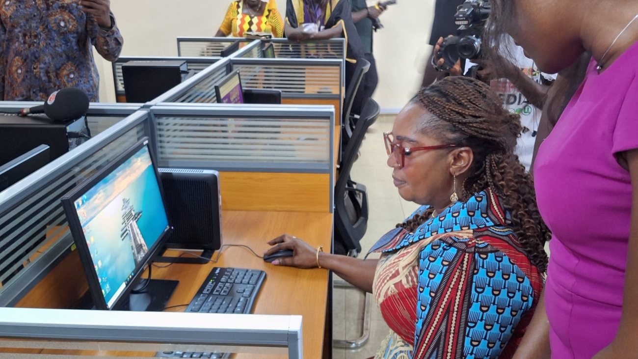 Eastern Regional Minister, Hon. Rita Akosua Adjei Awatey, exploring one of the newly installed computers in the Digital Education lab at PWCE,