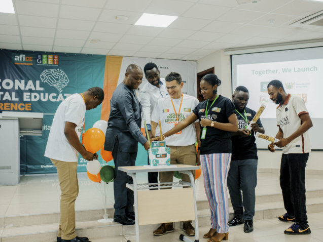 Cake cutting for the launch of the digital education platform for school leaders in Ghana