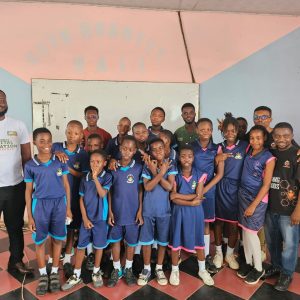 A group photo featuring the coders, the team from afiDE Ghana, the team from AmaliTech, and two Computing Facilitators from Jays International School.